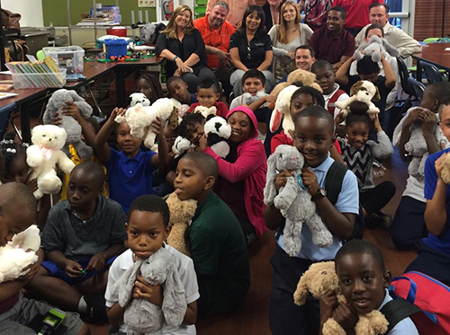 Little hugs donated stuffed animals to children at the Milagro center