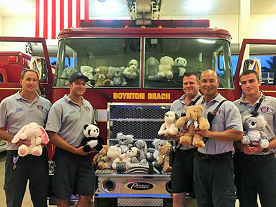 5 boynton beach firefighters with adorable stuffed plushies from Little Hugs