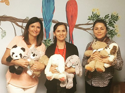 Center for family services team with little hugs adorable stuffed plushies