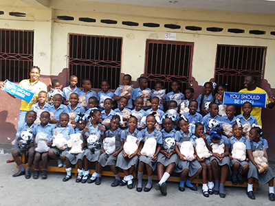 Franz Foundation children with donated little hugs stuffed animals