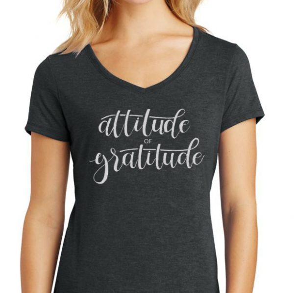 women's black v-neck with "attitude of gratitude" printed on the front